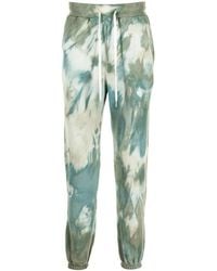 John Elliott - Tie-Dye Print Track Pants - Lyst
