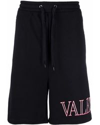 Valentino Garavani - Logo Printed Drop-Crotch Shorts - Lyst