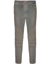 Balmain - Jeans slim con design a inserti - Lyst
