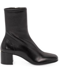 Prada - Logo-Plaque Ankle Boots - Lyst