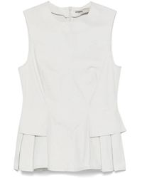 Remain - Peplum Top - Lyst