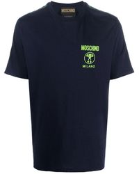 Moschino - Camiseta con franjas del logo - Lyst