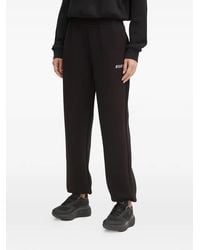 Guess - Rhinestone Logo Joggers - Lyst