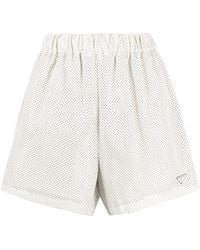 Prada - Shorts Mit Logo-Schild - Lyst