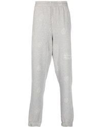 Martine Rose - All-Over Logo-Print Track Pants - Lyst