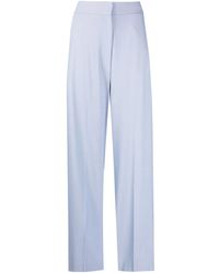 KHAITE - High-Waisted Wide-Leg Trousers - Lyst