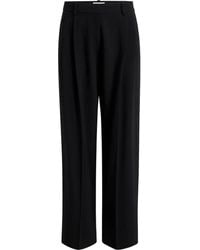 KHAITE - Belt-Loops Pleated Trousers - Lyst