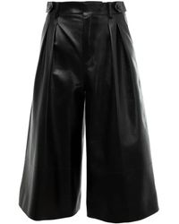 Saint Laurent - Pantalones cortos Jupe - Lyst