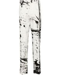 Alexander McQueen - Pantalones pitillo con estampado gráfico - Lyst