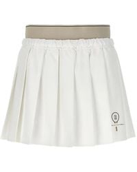 Brunello Cucinelli - Pleated Logo-Patch Mini Skirt - Lyst