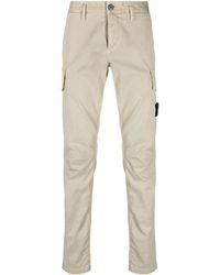 Stone Island - Pantalon fuselé à poches cargo - Lyst