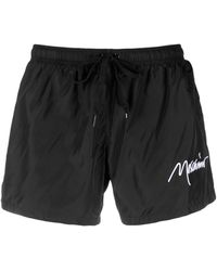 Moschino - Logo-embroidered Swim Shorts - Lyst