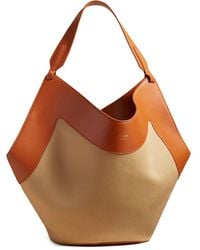 KHAITE - Bolso shopper Lotus mediano - Lyst
