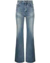 Saint Laurent - Bootcut-Jeans mit hohem Bund - Lyst