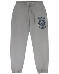 DENIM TEARS - University Logo-Print Track Pants - Lyst