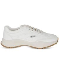 Prada - Logo-Plaque Leather Sneakers - Lyst