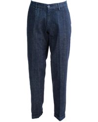 Cruna - Button-Fastening Tapered Jeans - Lyst