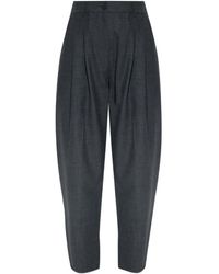 Studio Nicholson - Pleated Tapered Wool Trousers - Lyst