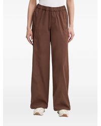Under Armour - Unstoppable Woven Elasticated-Waistband Logo-Patch Track Pants - Lyst
