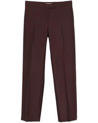KHAITE - Callen Pleated-Front Trousers - Lyst