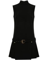Versace - Vestido corto plisado - Lyst