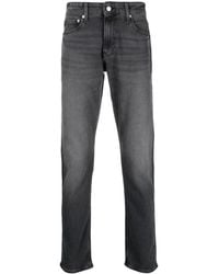 Calvin Klein - Mid-rise Tapered-leg Jeans - Lyst