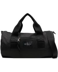 Calvin Klein - Reisetasche mit Logo-Patch - Lyst