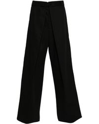 Givenchy - Weite Canvas-Hose mit Bundfalten - Lyst