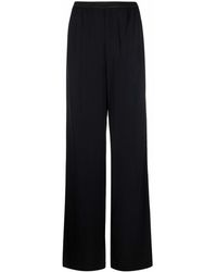 Balenciaga - Pantalones anchos con logo en la cinturilla - Lyst