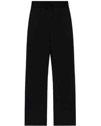 Balmain - Logo-Embroidered Drawstring Trousers - Lyst