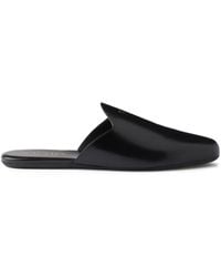 Prada - Embossed-Logo Leather Mules - Lyst