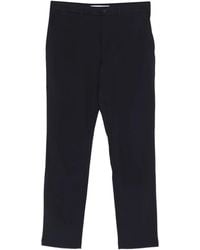 Lacoste - Pantalones con botones - Lyst