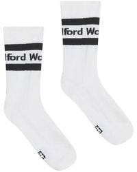 Wolford - Logo-Knit Ribbed Socks - Lyst