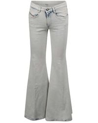DIESEL - Distressed Flared Jeans - Lyst