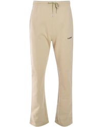 flâneur - Essential Logo-Print Track Pants - Lyst