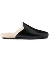 Prada - Leather Flat Mules - Lyst