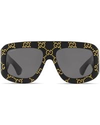 Gucci - Getönte Pilotenbrille mit GG - Lyst