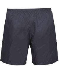 Prada - Logo Patch Recycled Nylon Swim Shorts - Lyst