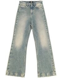 HTC - Stonewashed Flared Jeans - Lyst