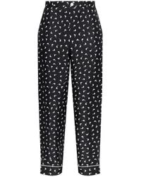 Moschino - Silk Trousers With Print - Lyst