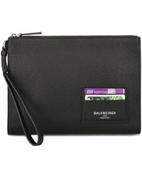Balenciaga - Zip Wrist-Strap Leather Pouch Bag - Lyst