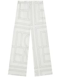 TOTEME - Logo-Embroidered Wide-Leg Trousers - Lyst