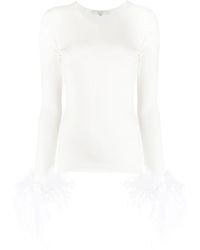 MANURI - Elektra Feather-Trim Stretch Blouse - Lyst