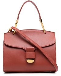 Coccinelle Buckled Leather Shoulder Bag in Brown | Lyst
