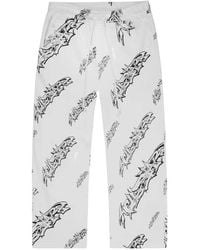 HELLSTAR - Graffiti-Print Track Pants - Lyst