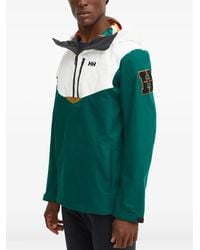 Helly Hansen - Chaqueta con capucha y logo - Lyst
