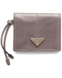 Prada - Small Leather Bifold Wallet - Lyst