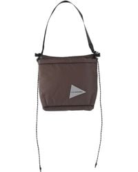 and wander - Logo-Print Padded Shoulder Bag - Lyst