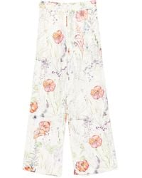McQueen - Floral-Print Trousers - Lyst