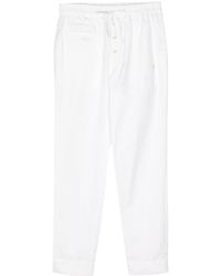Undercover - Panelled cotton track pants - Lyst